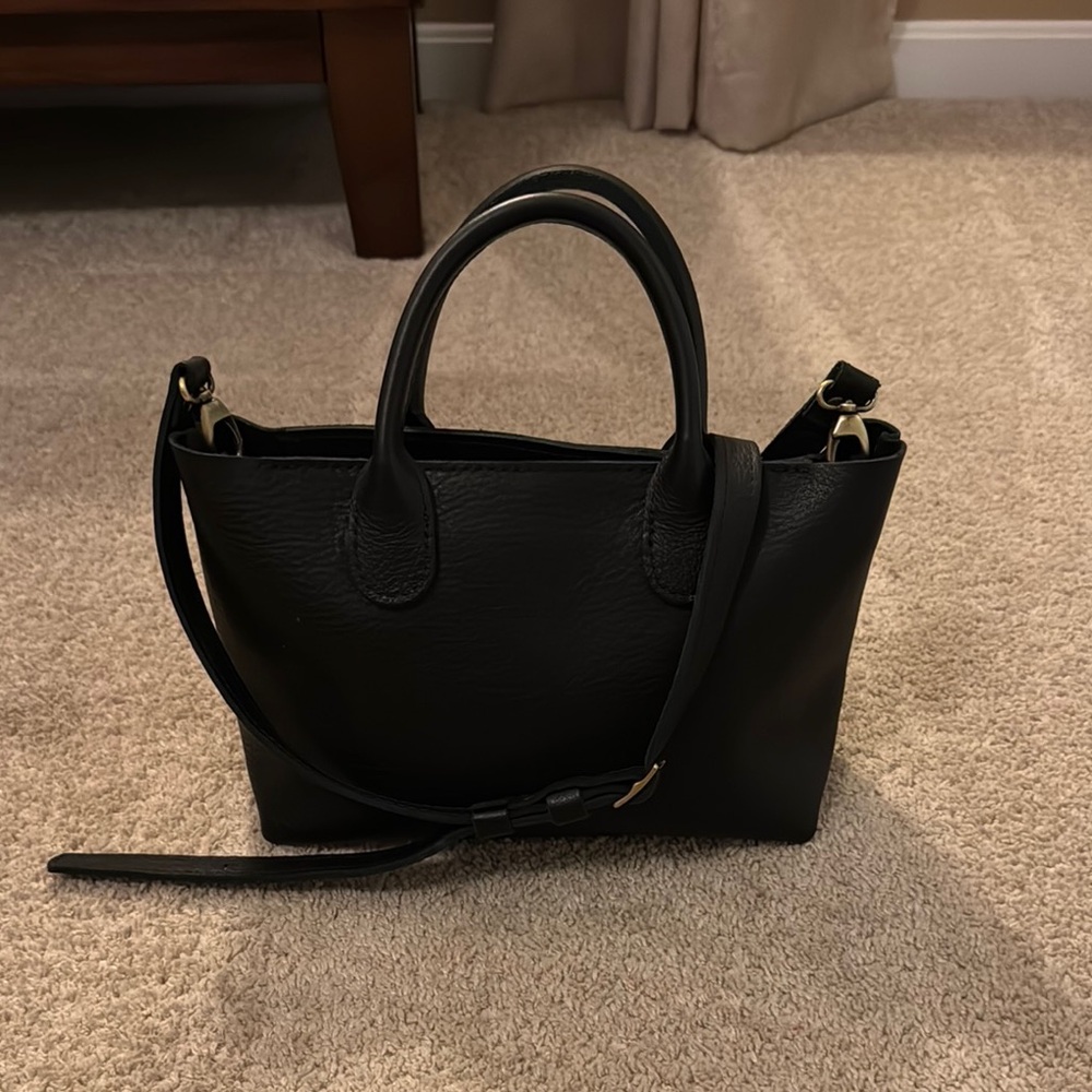 Black Shoulder Bag with Adjustable Strap and Structured Shape